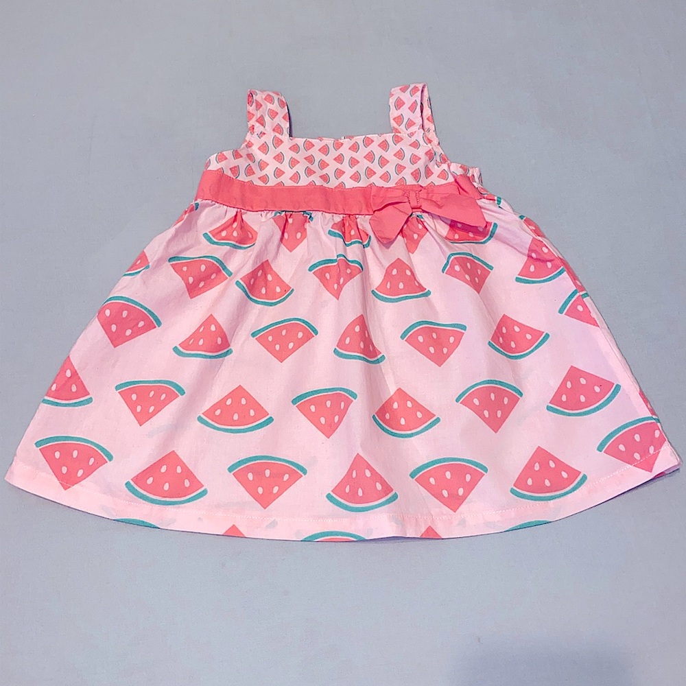 Summertime light pink watermelon print dress.